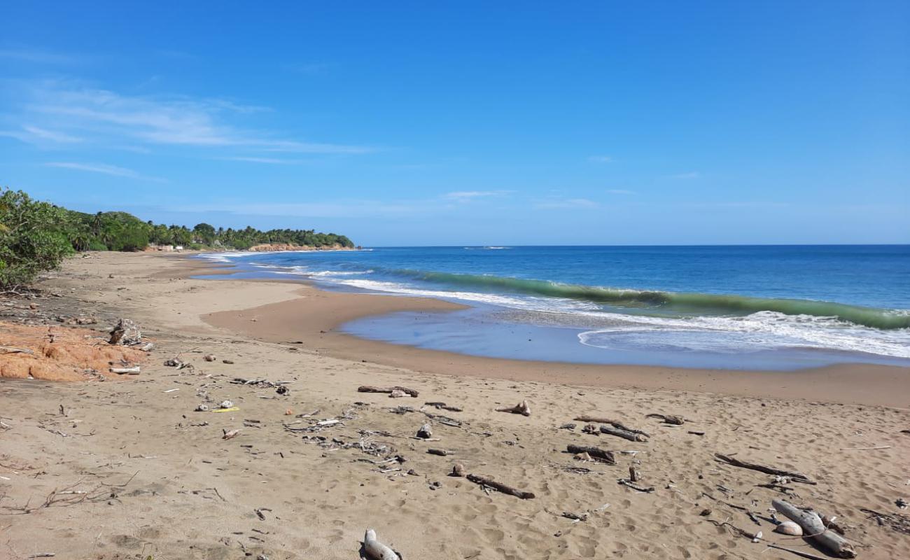 Фото Panamaes Beach с светлый песок поверхностью