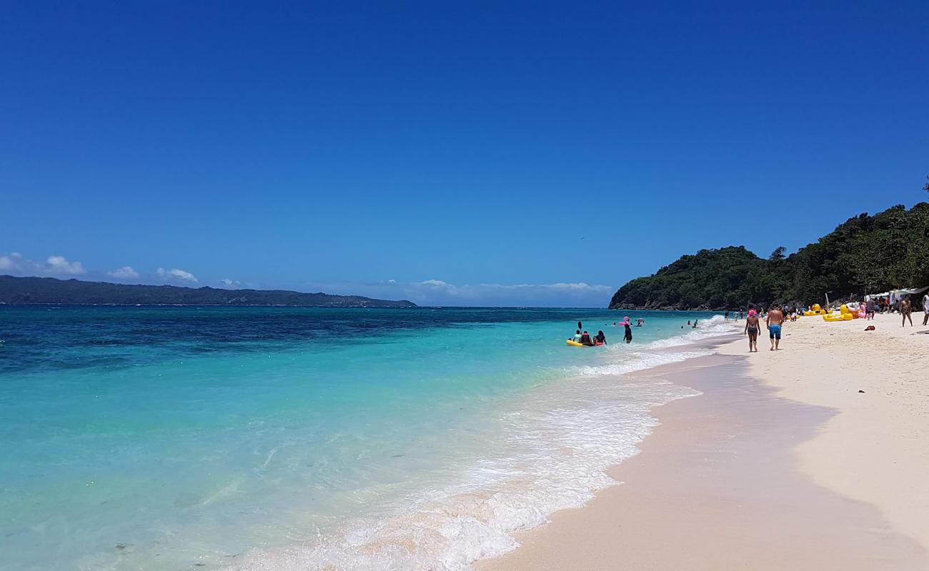 Фото Puka Shell Beach с золотистый песок поверхностью