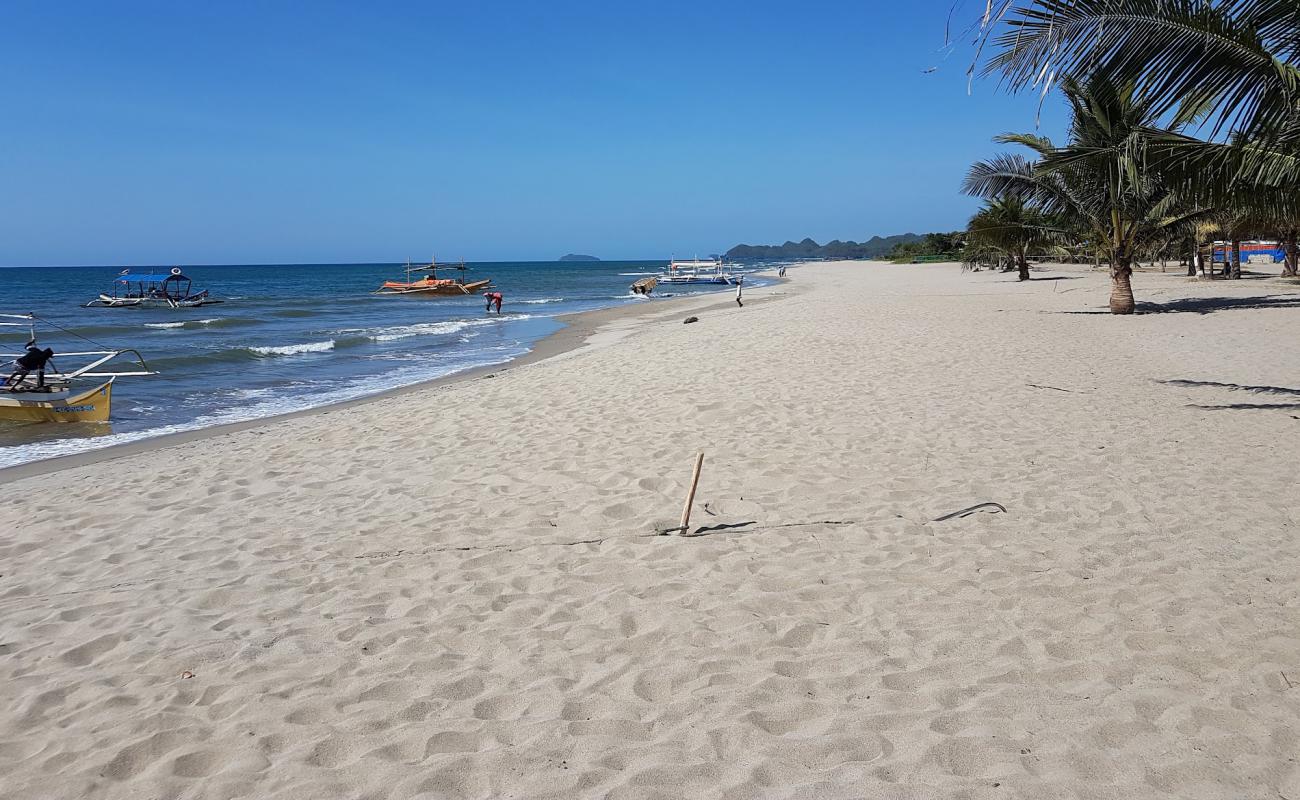 Фото Poblacion Beach с светлый песок поверхностью