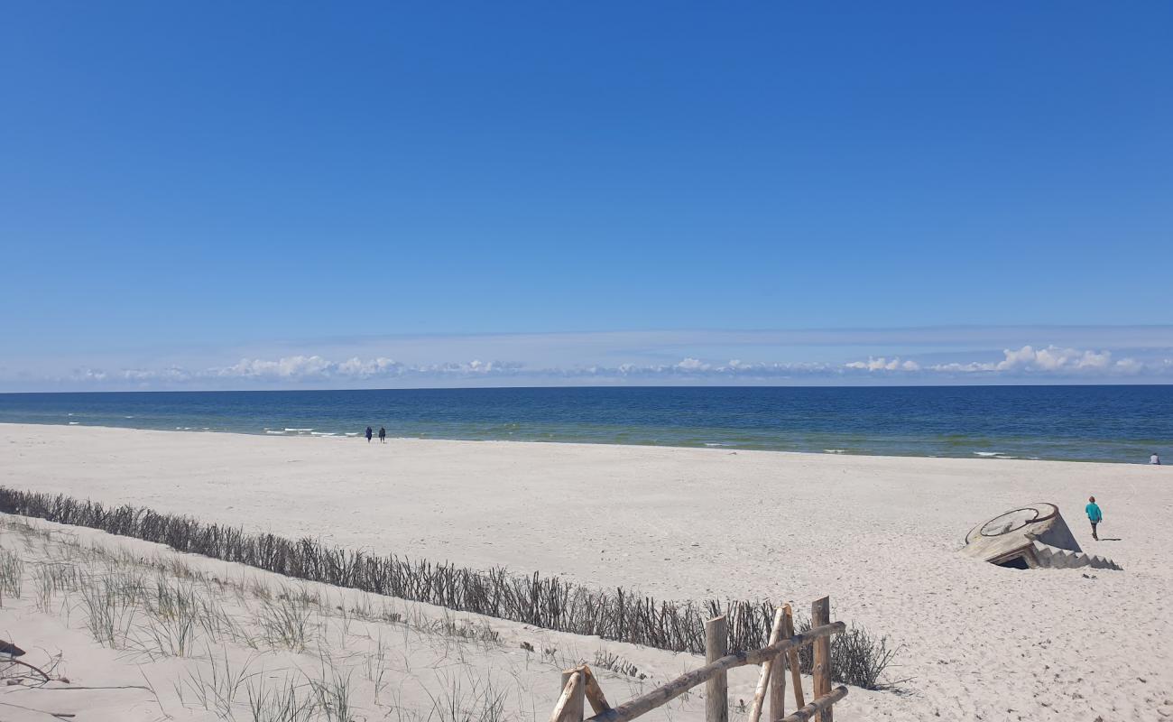 Фото Osetnik Beach с белый чистый песок поверхностью