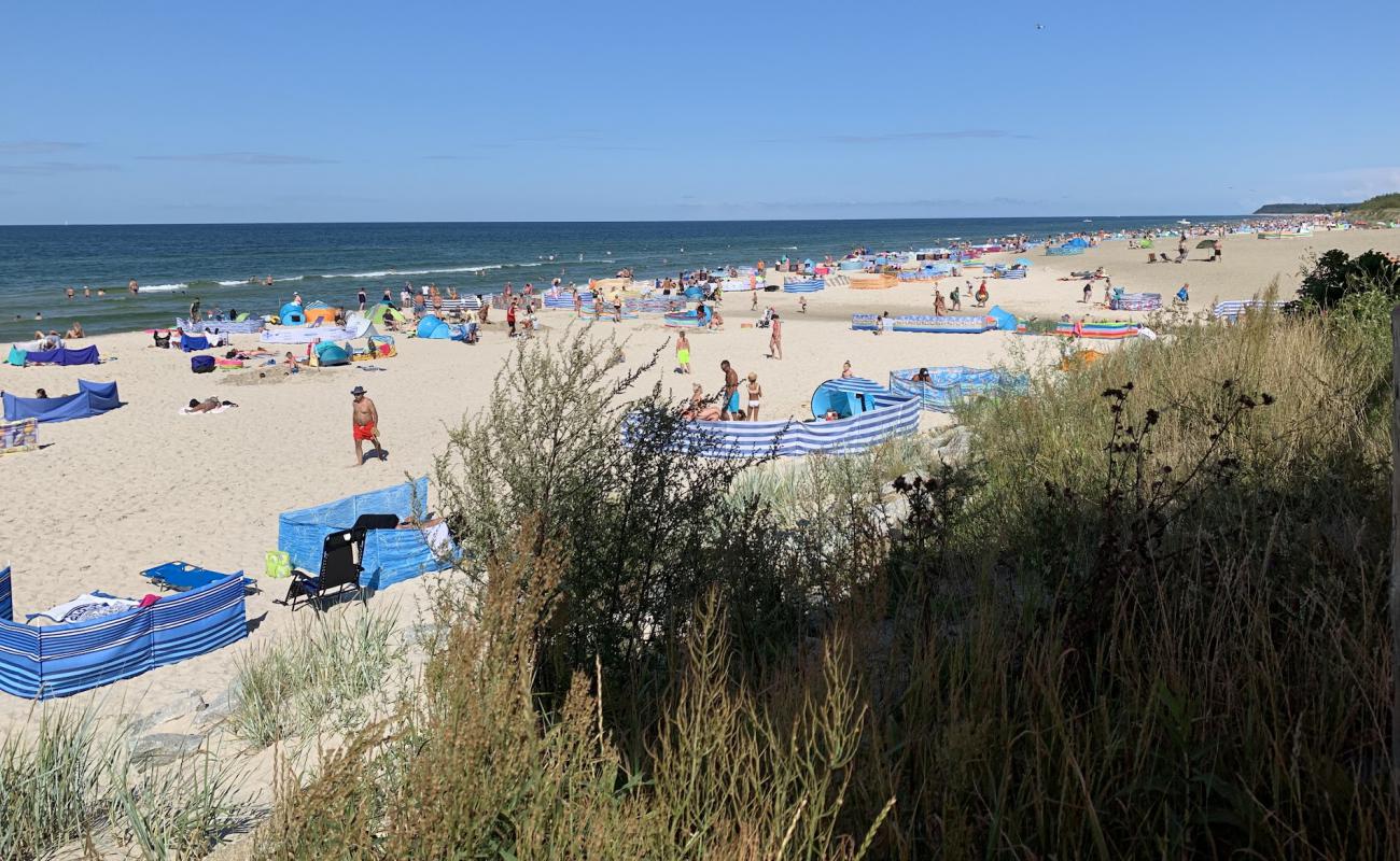 Фото Karviya - Vkhod Beach с светлый песок поверхностью