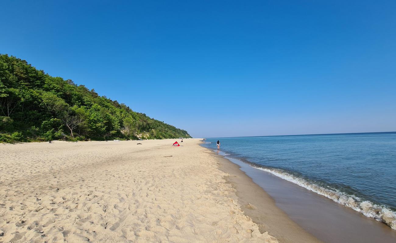 Фото Jastrzebia Gora II Beach с золотистый песок поверхностью