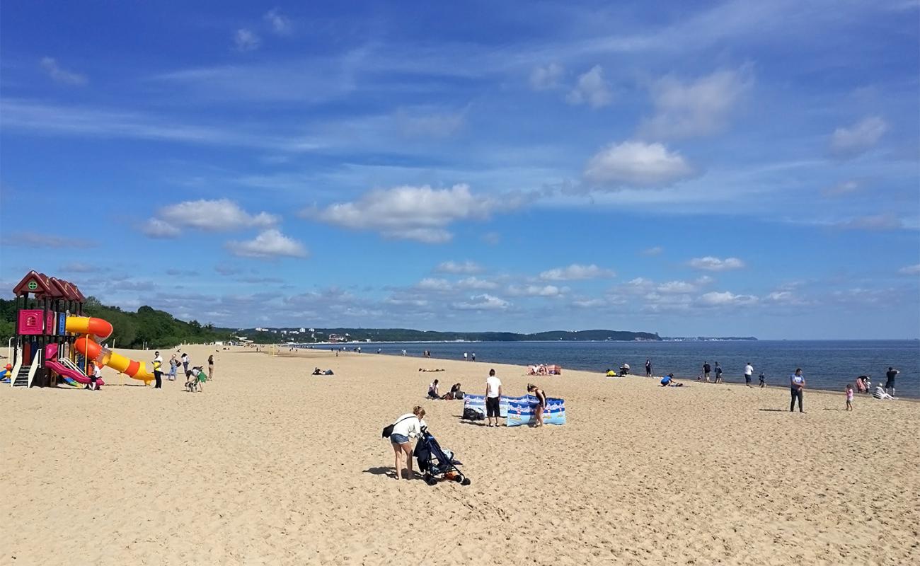 Фото Jelitkowo Beach II с светлый песок поверхностью