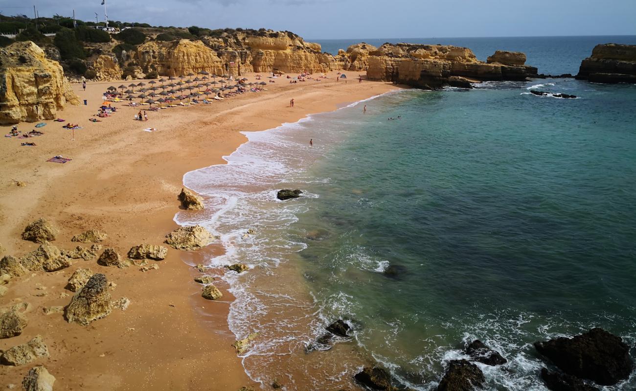 Фото Praia do Castelo с золотистый песок поверхностью