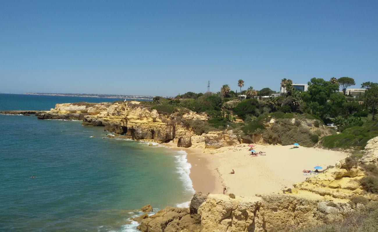 Фото Praia da Balbina с светлый песок поверхностью