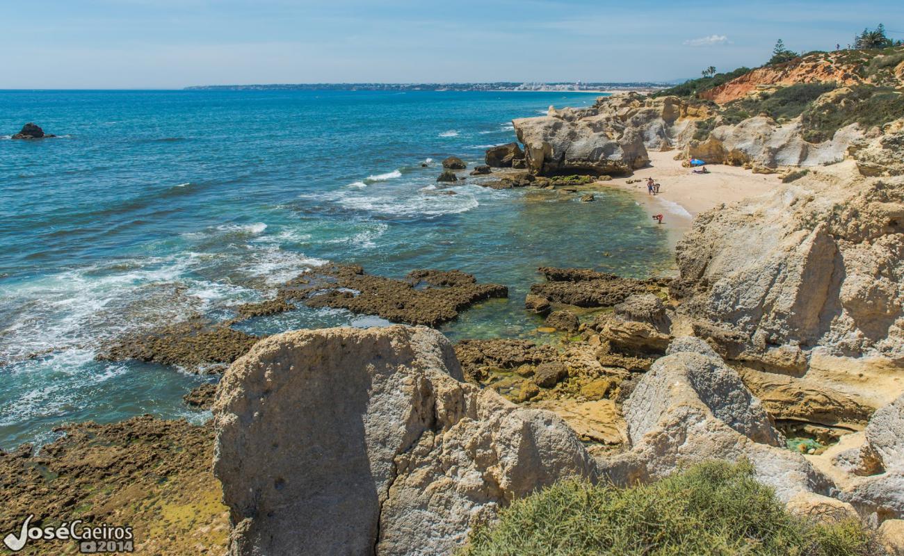 Фото Praia de Sao Lourenco с светлый песок поверхностью