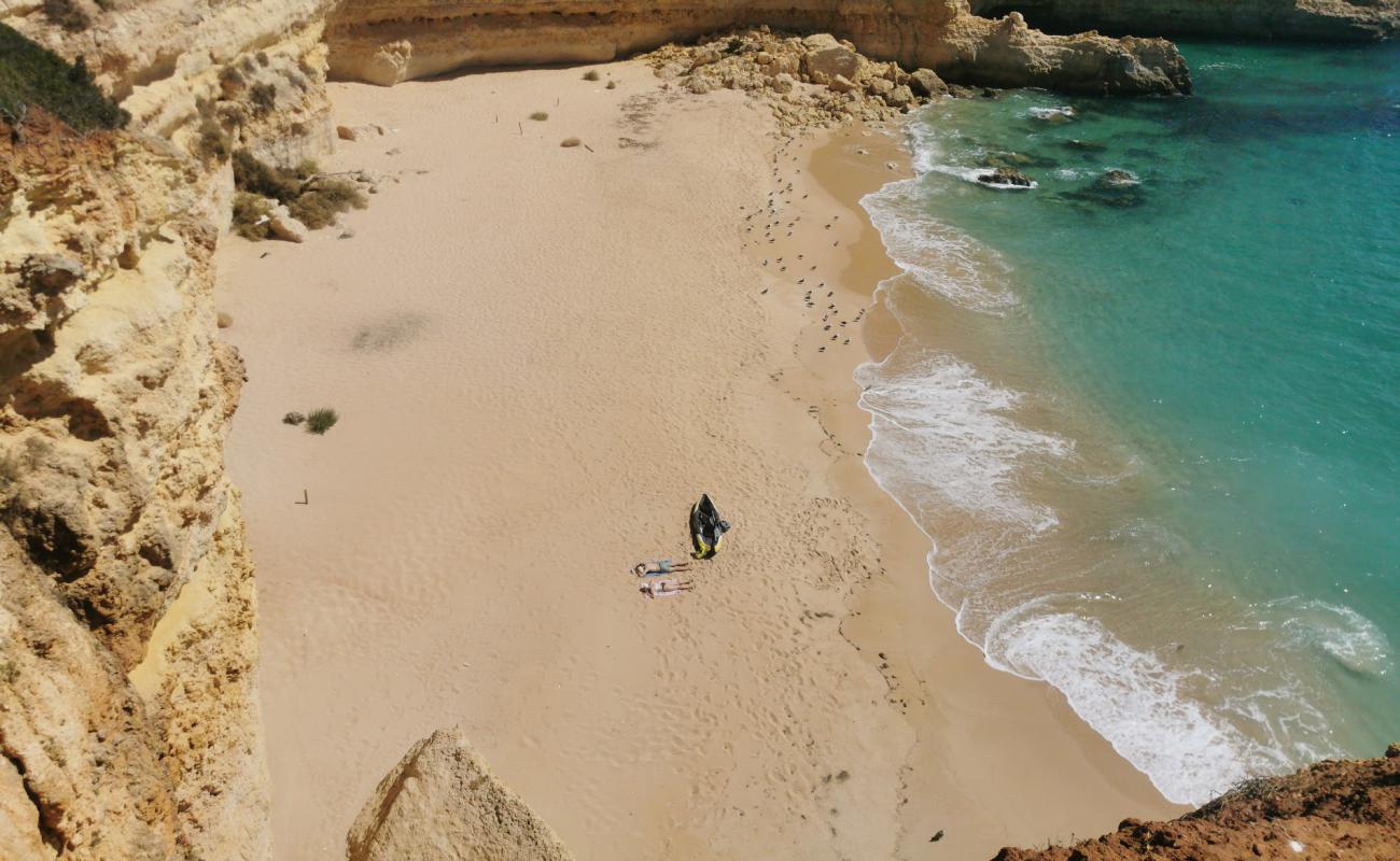 Фото Praia do Pontal с темный чистый песок поверхностью