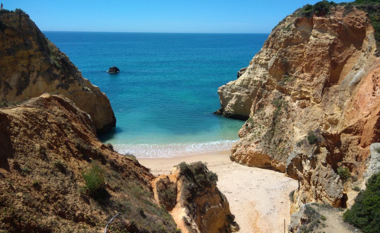 Фото Praia Joao de Arens с золотистый песок поверхностью