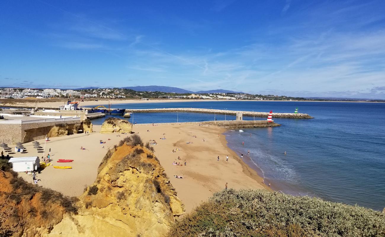 Фото Miradouro Praia da Batata с темный чистый песок поверхностью