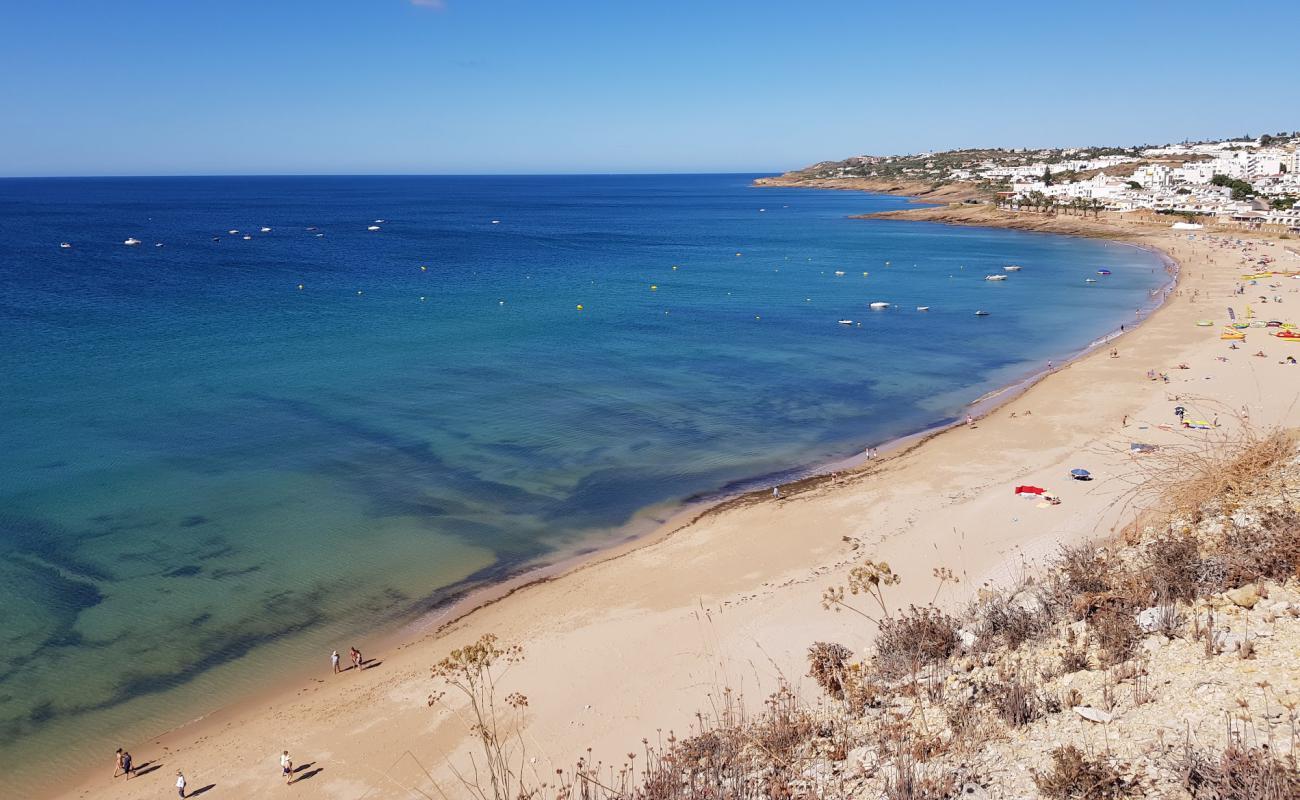 Фото Praia da Luz с золотистый песок поверхностью