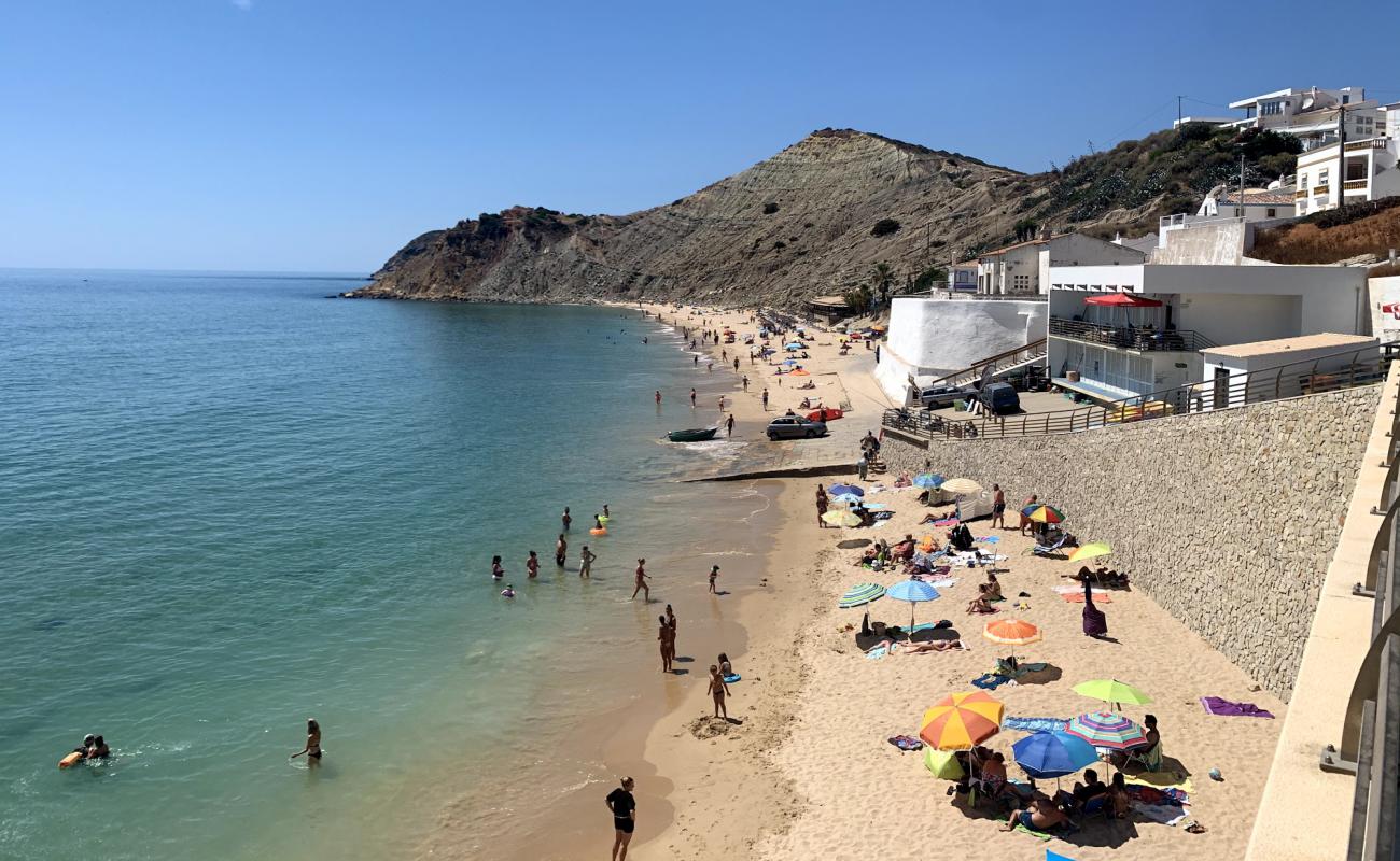 Фото Praia do Burgau с золотистый песок поверхностью