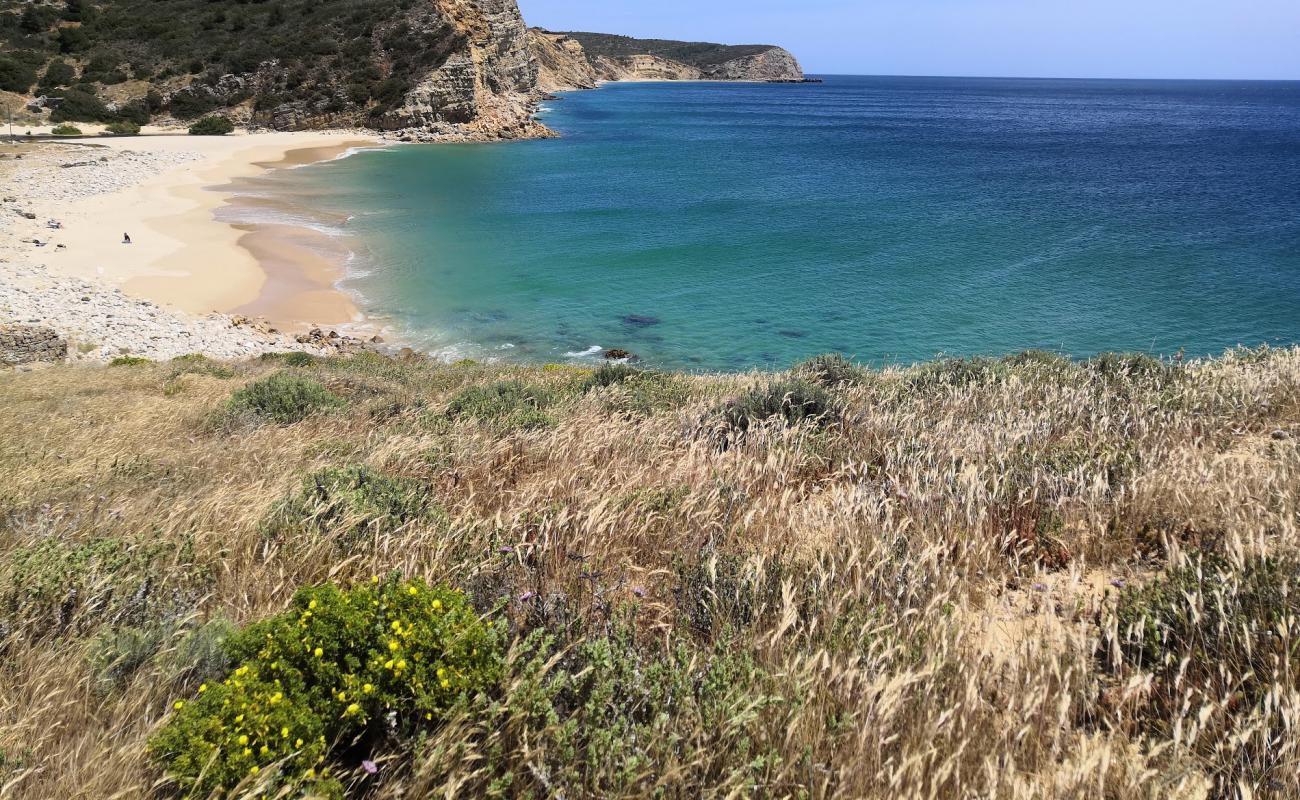 Фото Praia da Boca do Rio с золотистый песок поверхностью