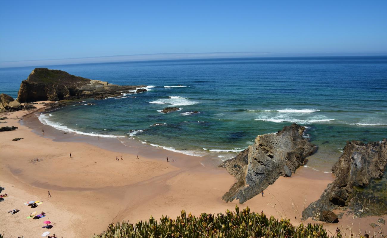 Фото Beach Alteirinhos с золотистый песок поверхностью