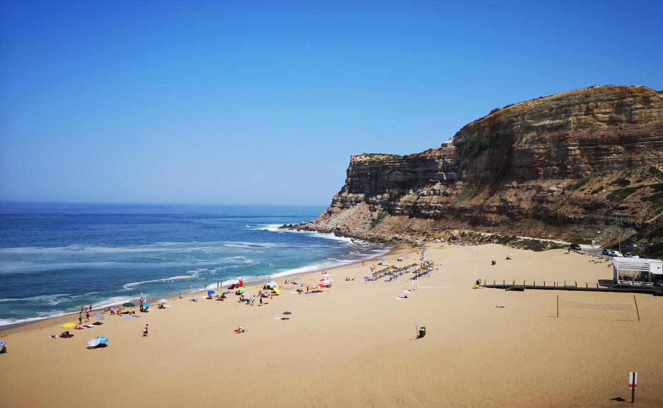 Фото Praia da Calada с золотистый песок поверхностью