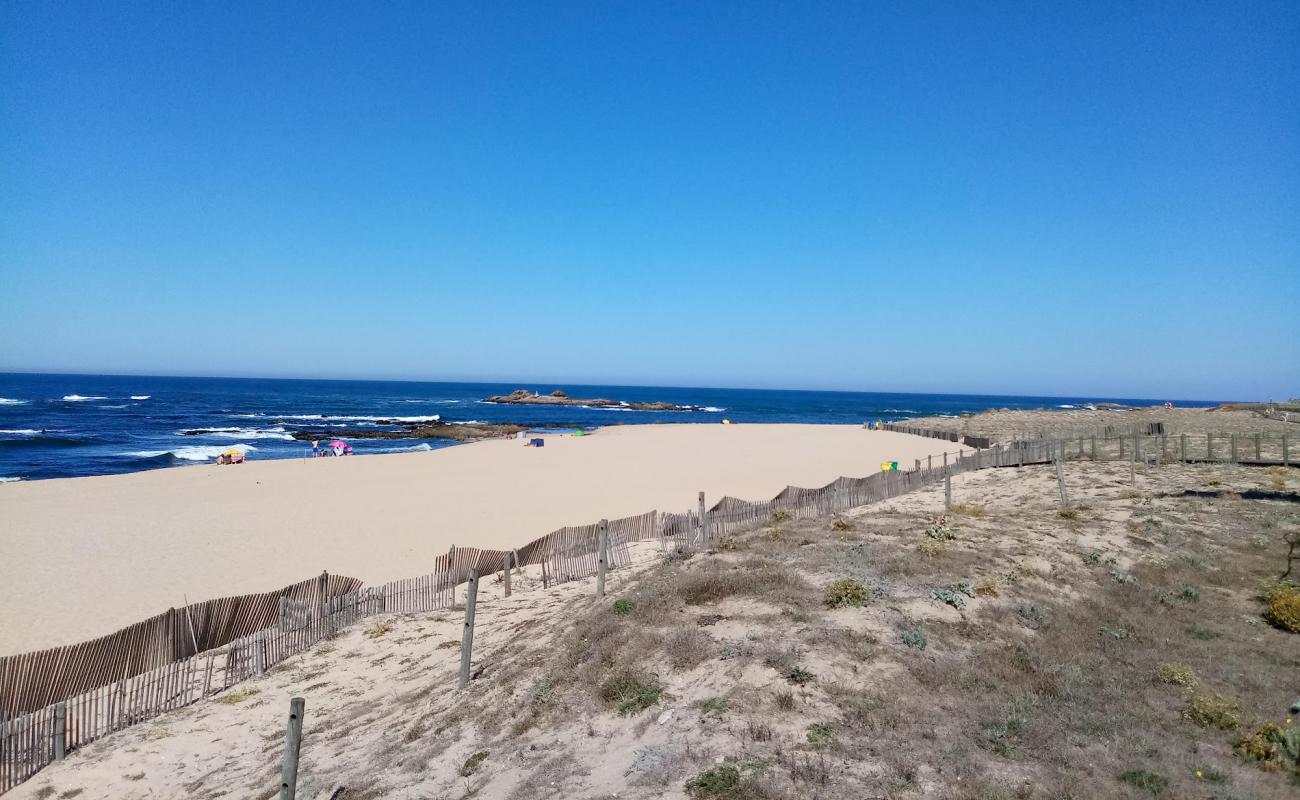 Фото Praia da Memoria с золотистый песок поверхностью