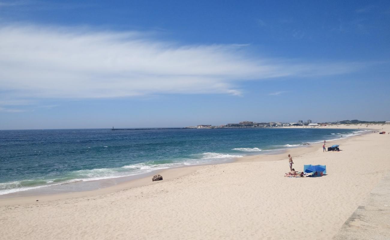 Фото Praia de Arvore с золотистый песок поверхностью