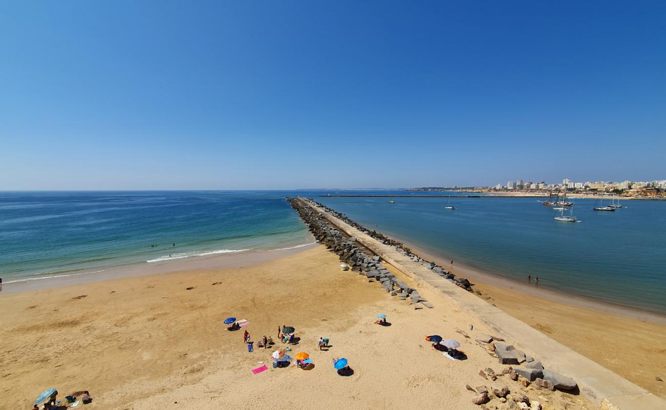 Фото Praia do Molhe с светлый песок поверхностью