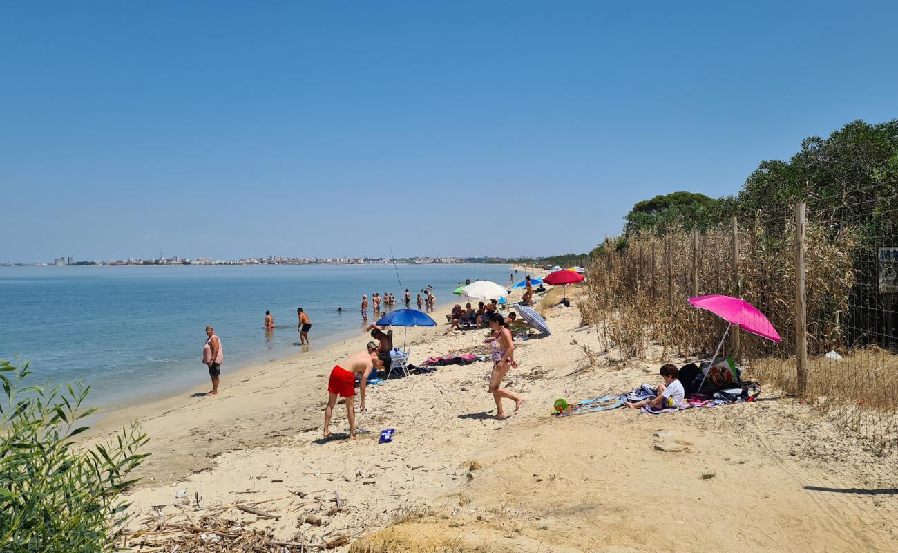 Фото Praia da Ponta dos Corvos с светлый песок поверхностью