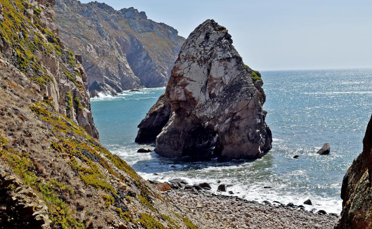 Фото Praia do Lourisal с камни поверхностью