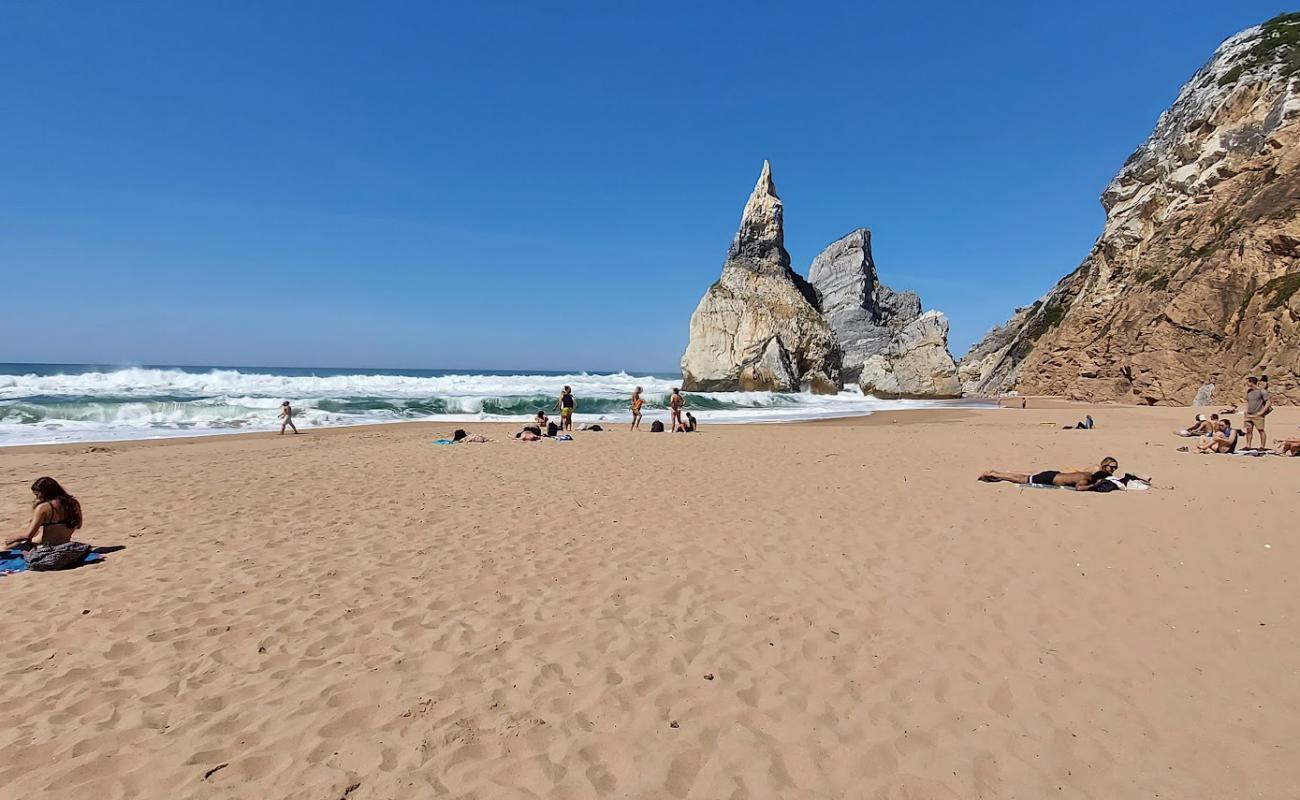 Фото Praia da Aroeira с светлый песок поверхностью