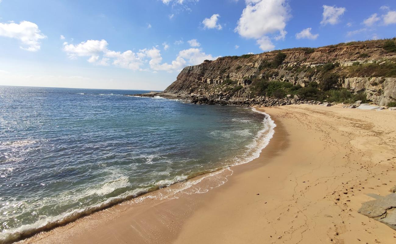 Фото Praia de Vale Pombas с светлый песок поверхностью