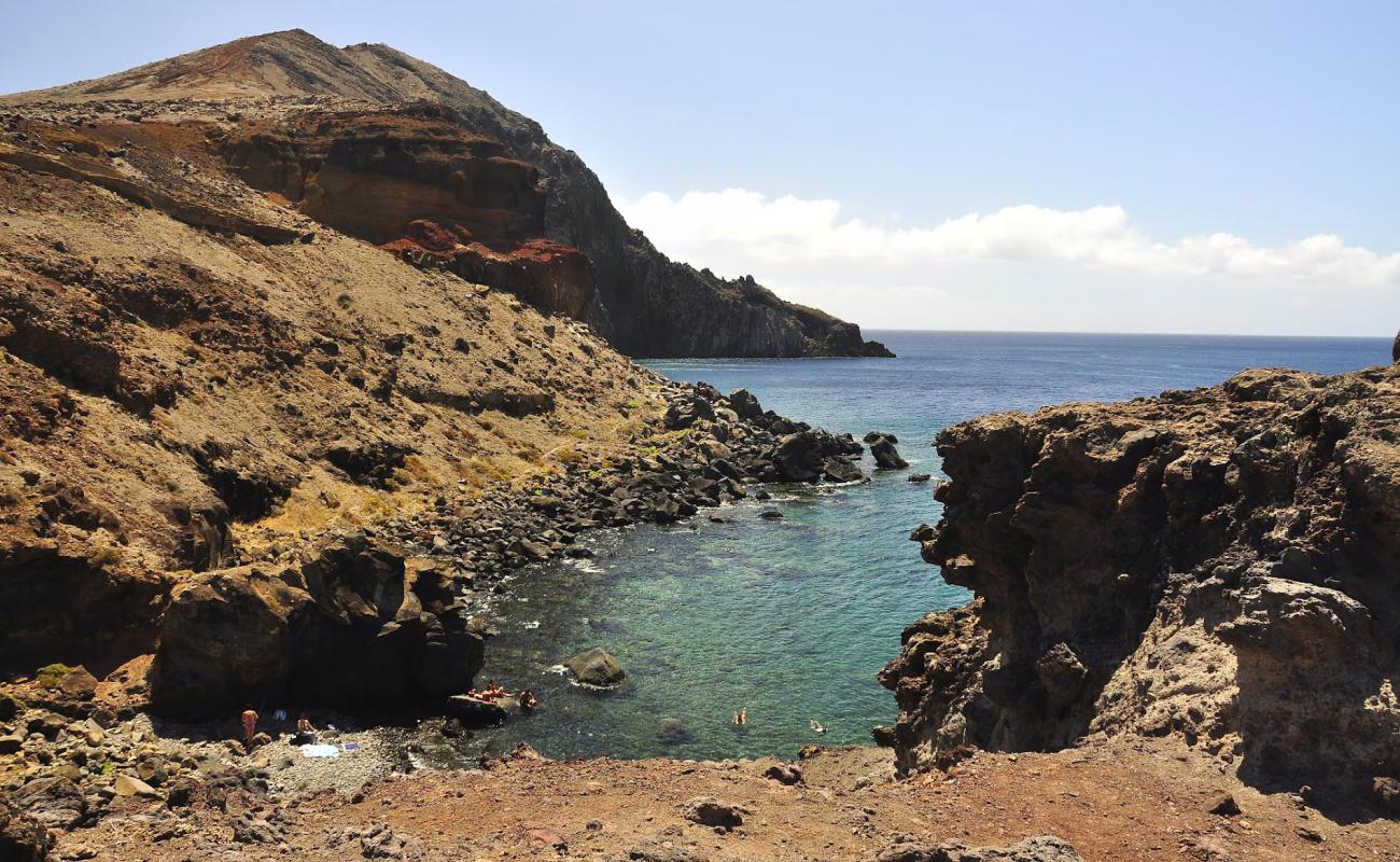 Фото Praia do Sardinha с камни поверхностью