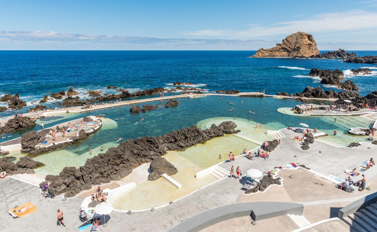 Фото Piscinas Naturais de Porto Moniz с бетон поверхностью