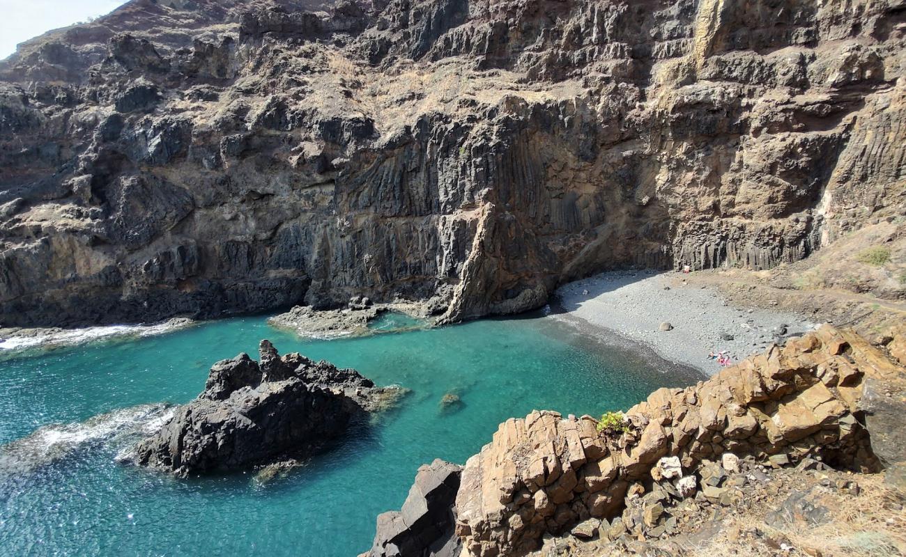 Фото Praia do Zimbralinho с серая галька поверхностью