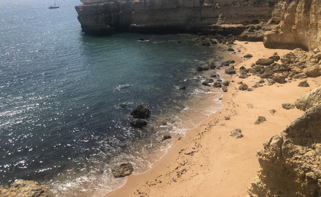 Фото Praia da Ponta Pequena с светлый песок поверхностью