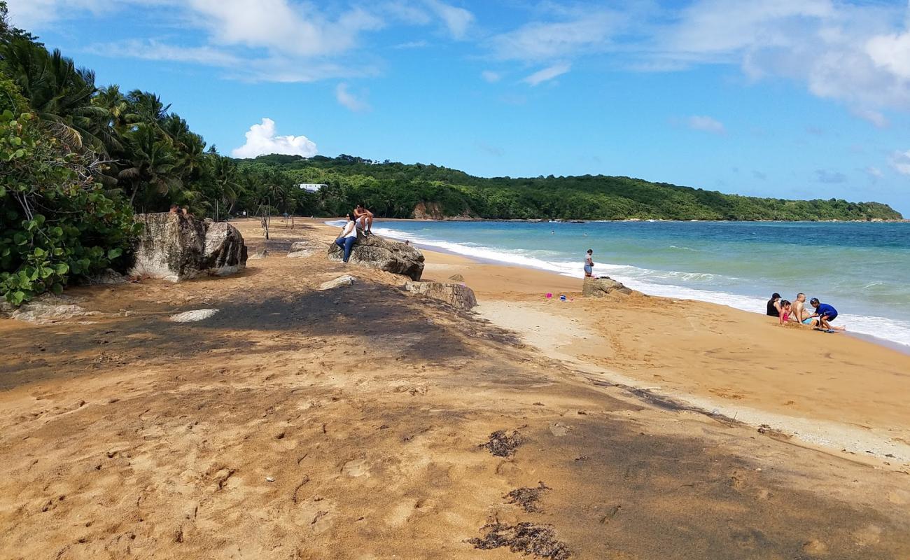 Фото Playa El Cocal с золотистый песок поверхностью