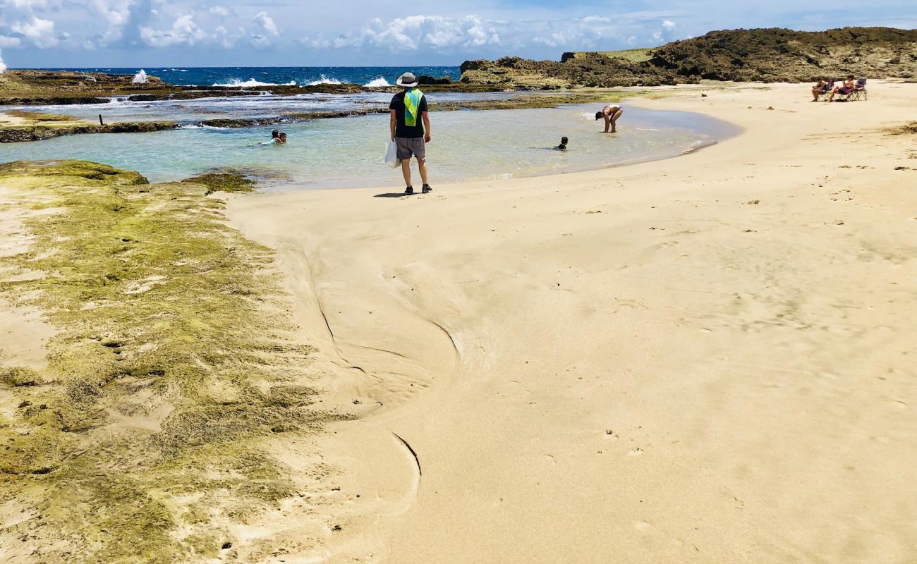 Фото Sardineras beach с светлый песок поверхностью