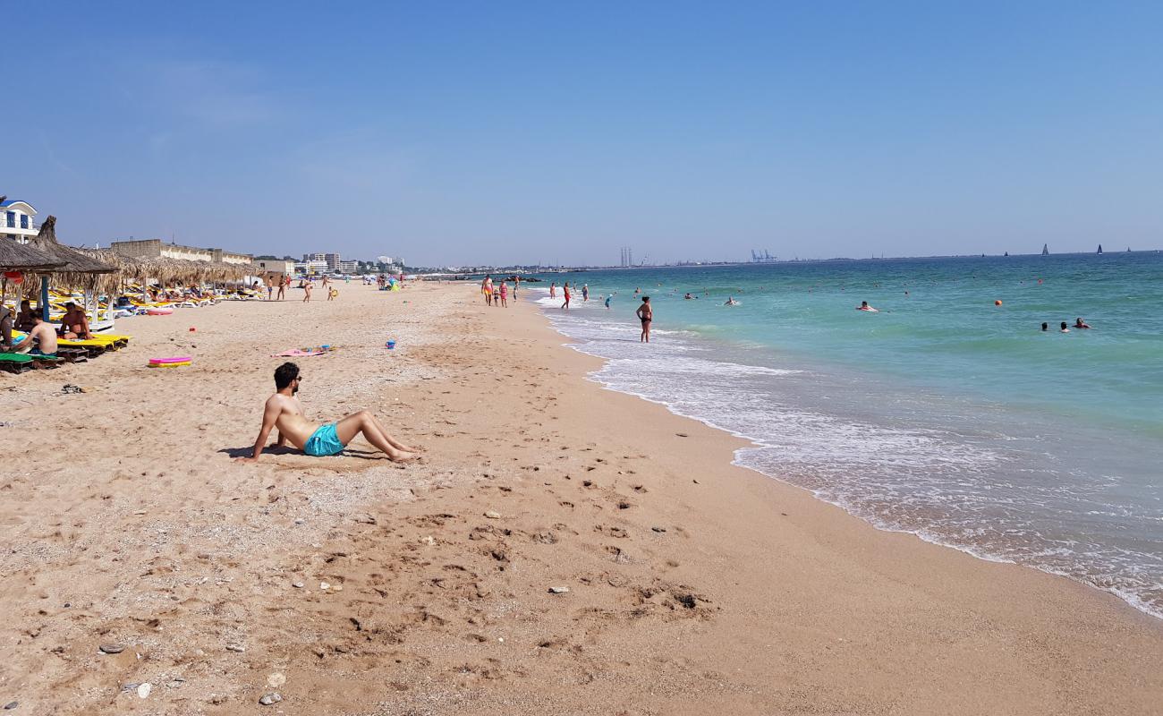 Фото Boeme beach с светлый песок поверхностью