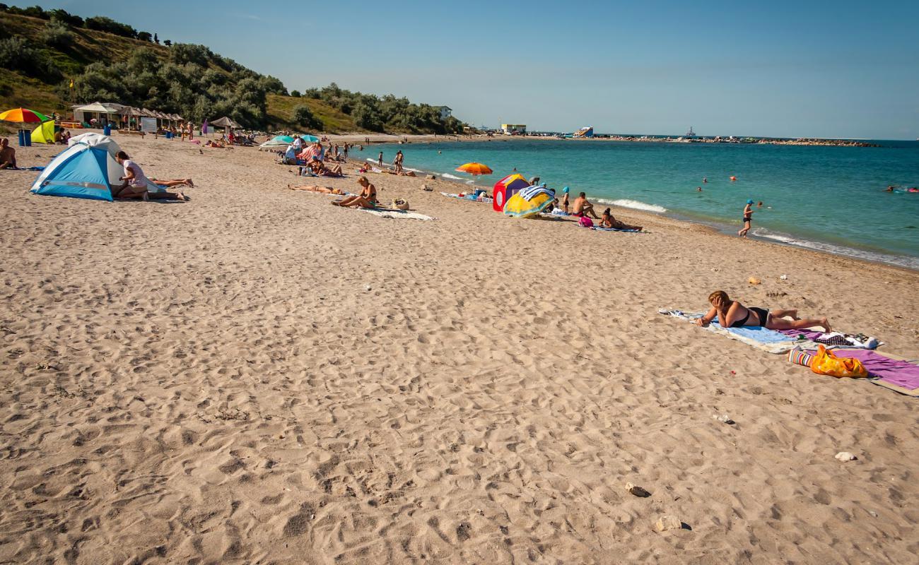 Фото Moon beach с светлый песок поверхностью