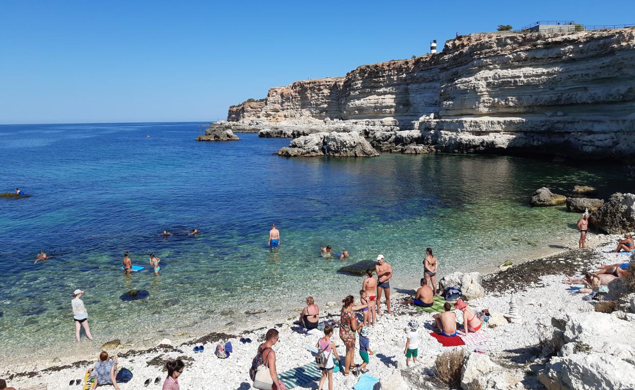 Фото Blue Bay beach с белая галька поверхностью