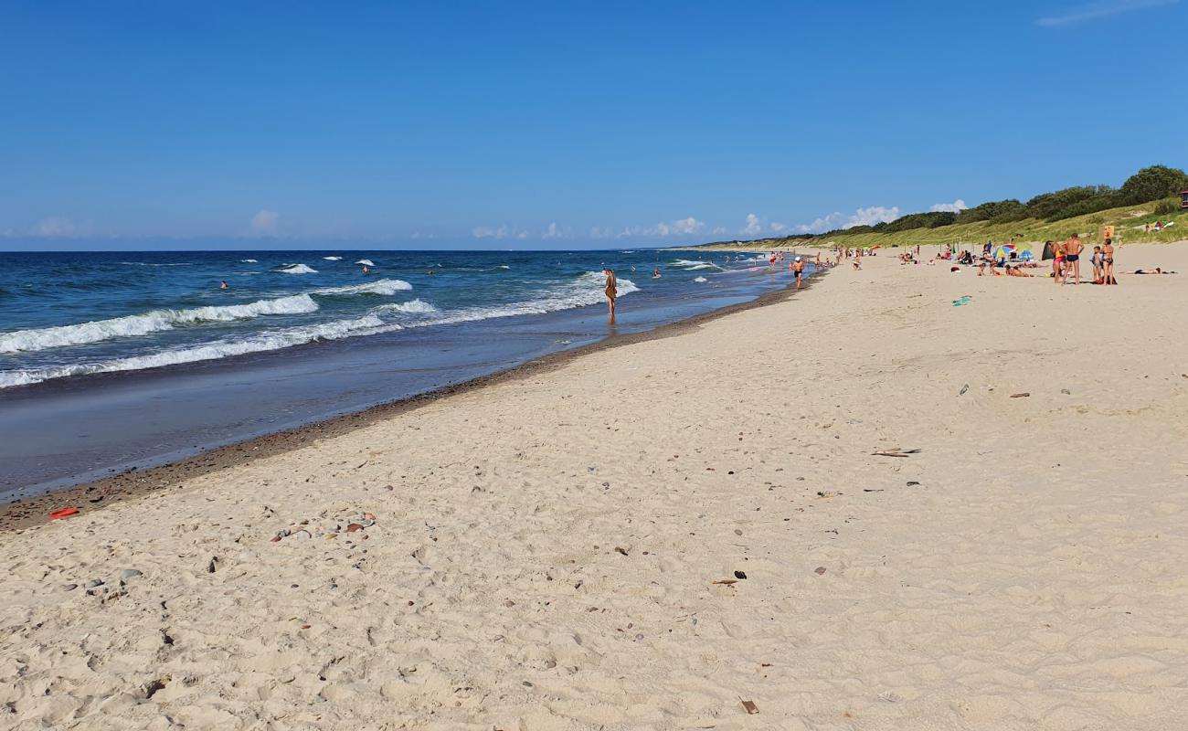 Фото Пляж морячка с светлый песок поверхностью