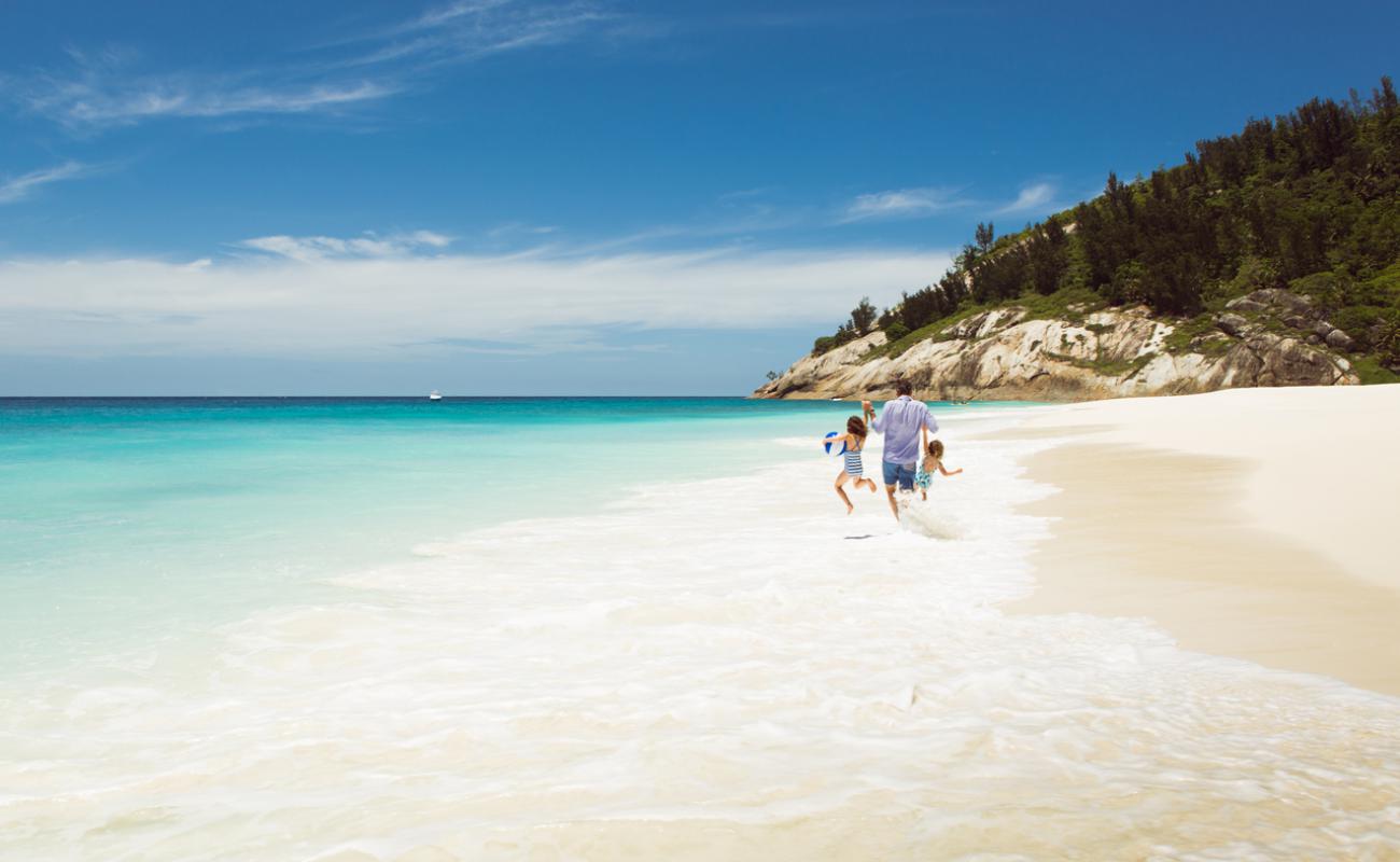 Фото North Island Beach с белый чистый песок поверхностью