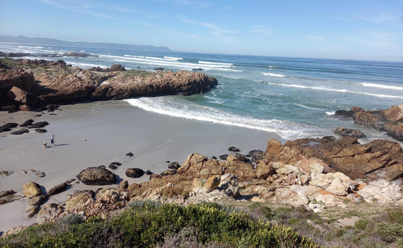 Фото Langbaai beach с золотистый песок поверхностью