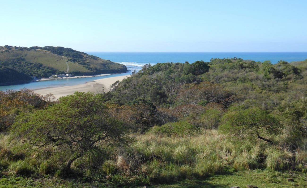 Фото Nqabara beach с светлый песок поверхностью