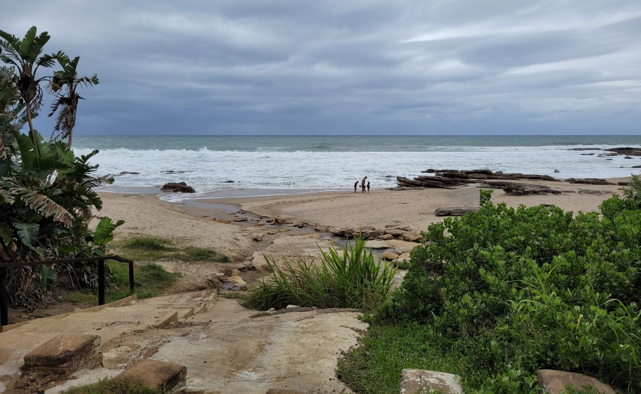 Фото Dassie beach с песок с камнями поверхностью