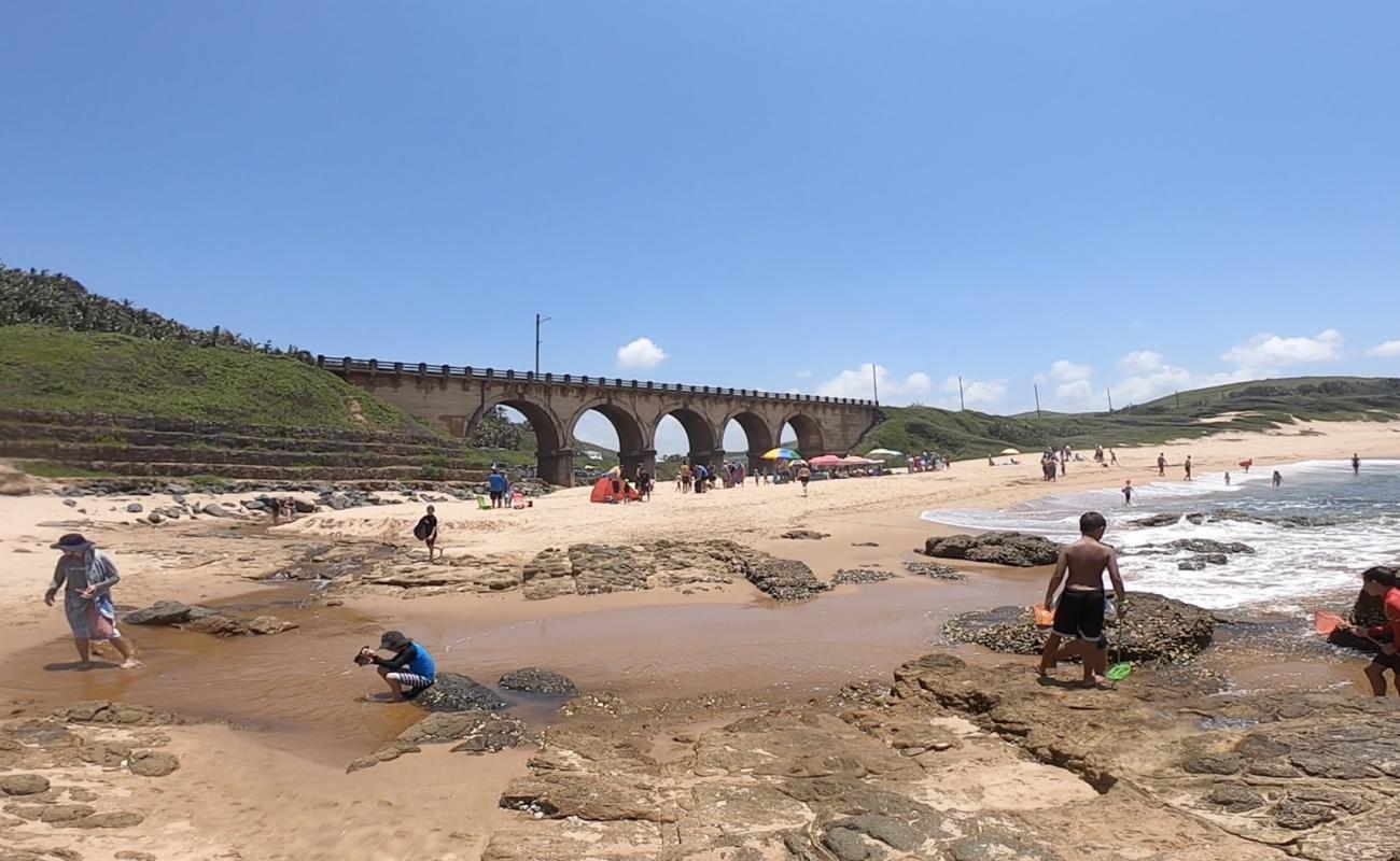 Фото Bazley beach с золотистый песок поверхностью