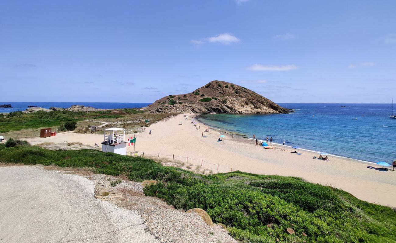 Фото Cala Mesquida с золотистый песок поверхностью