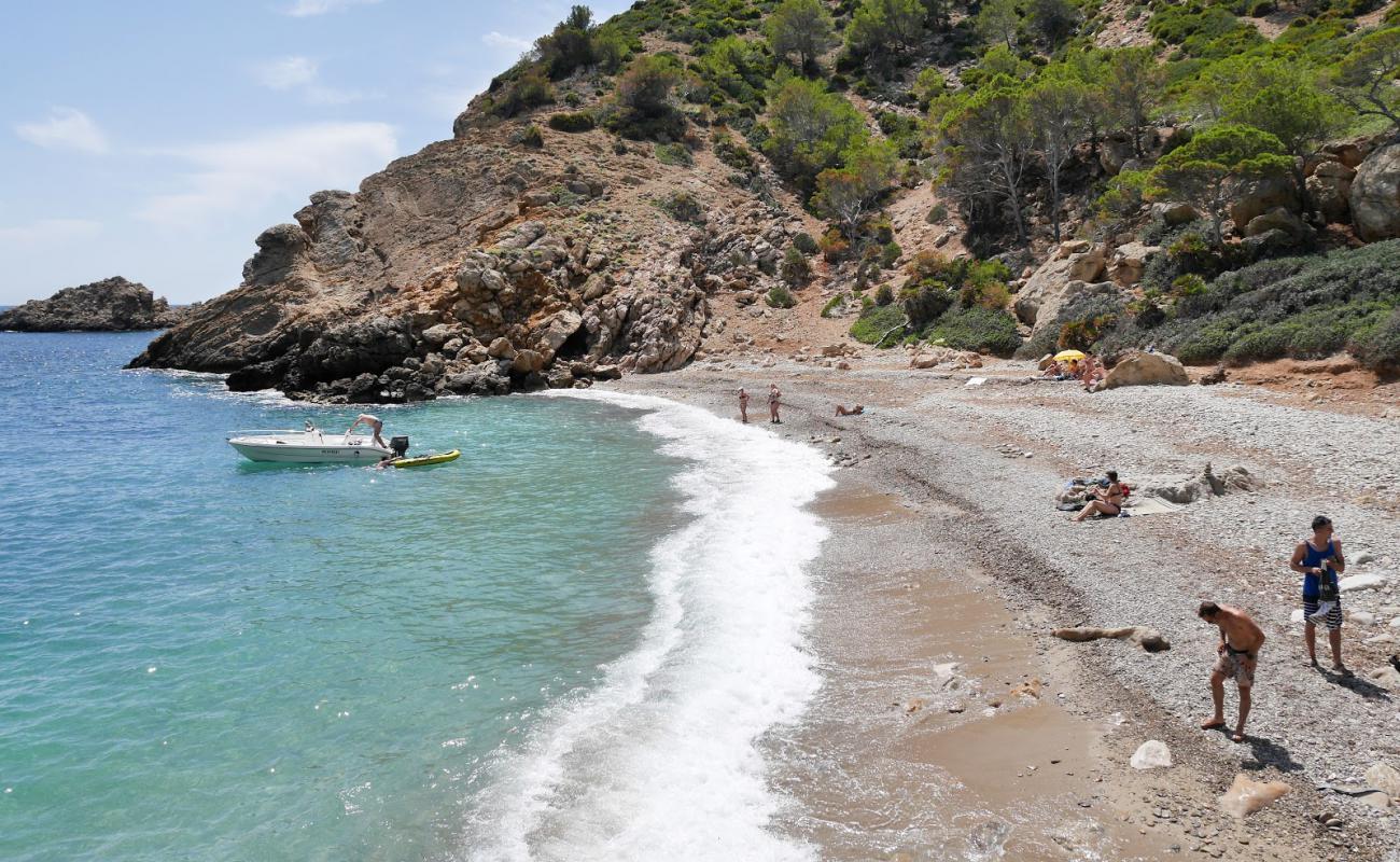 Фото Cala D'egos с песок с камнями поверхностью