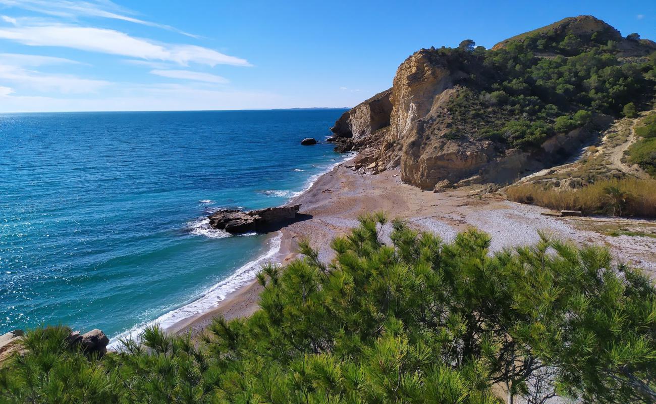 Фото Playa la Caleta с темный ракушечник поверхностью