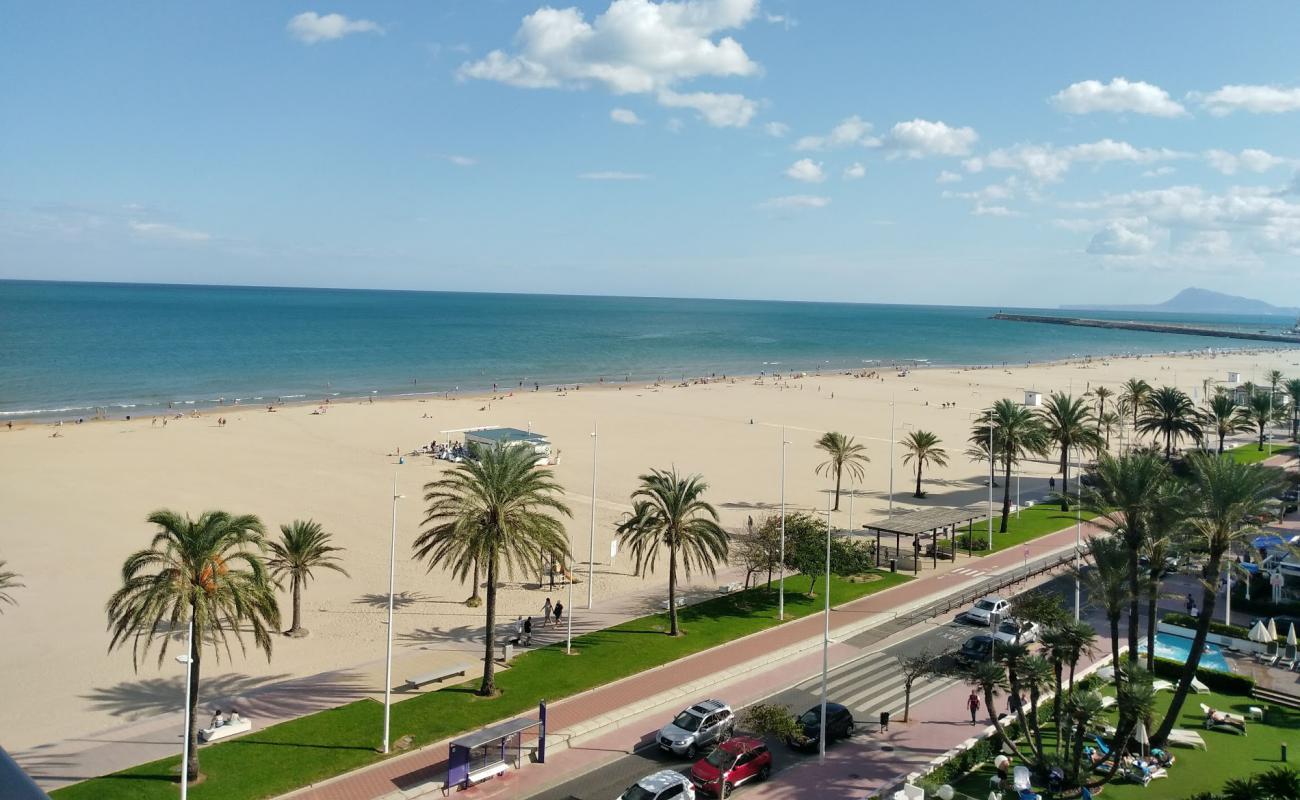 Фото Platja de Gandia с светлый песок поверхностью