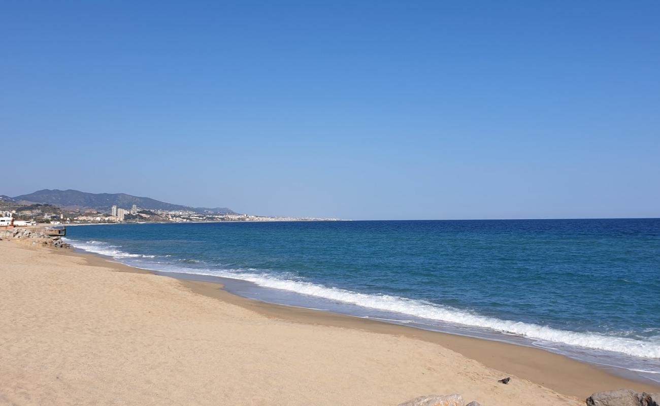 Фото Platja de Badalona с светлый песок поверхностью