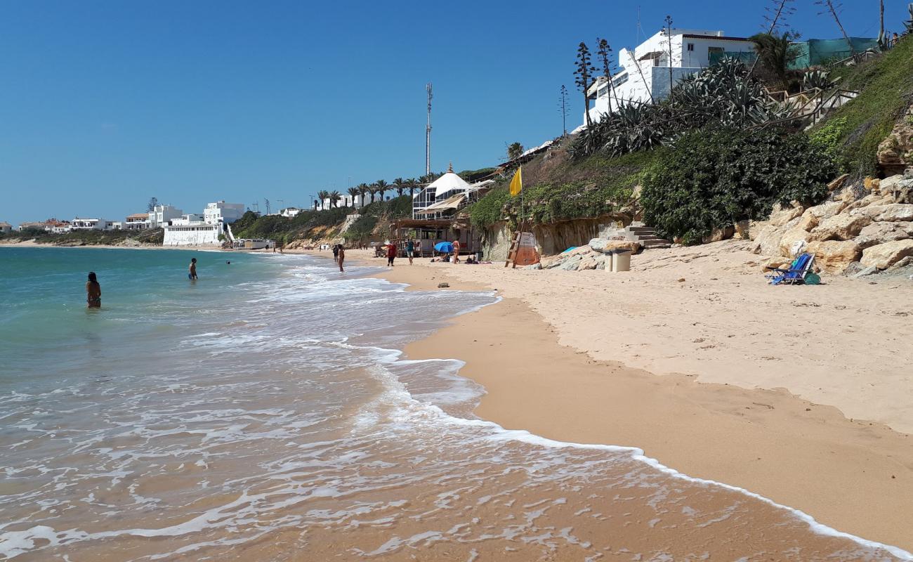 Фото Playa de Guadalupe с золотистый песок поверхностью