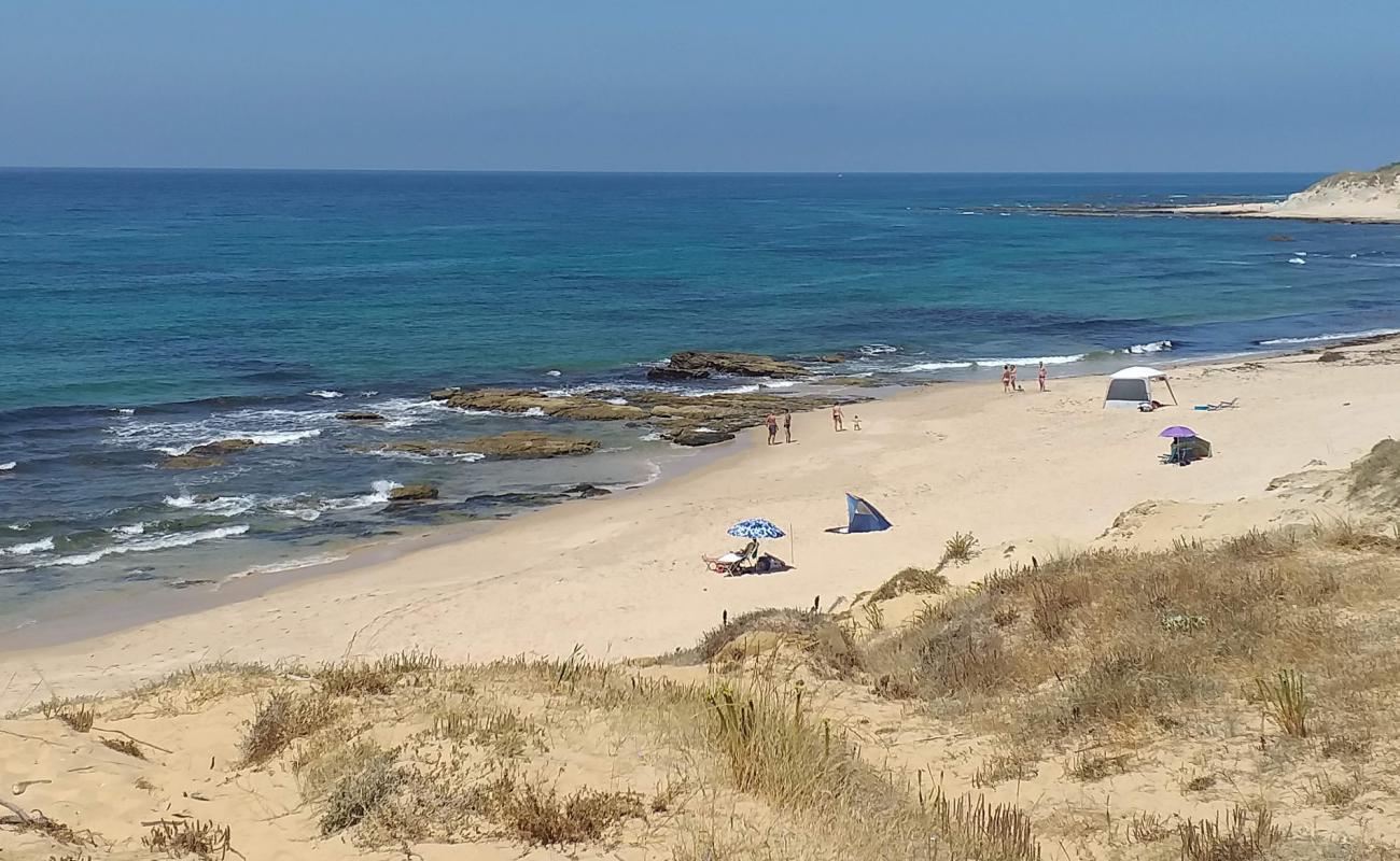 Фото Punta Paloma Playa с золотистый песок поверхностью