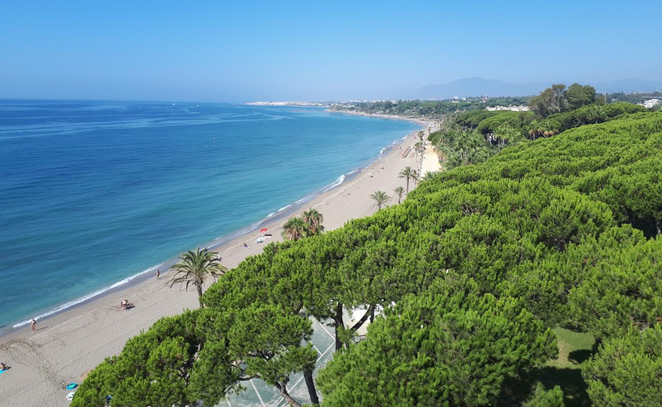 Фото Playa de Nagueles с серый песок поверхностью