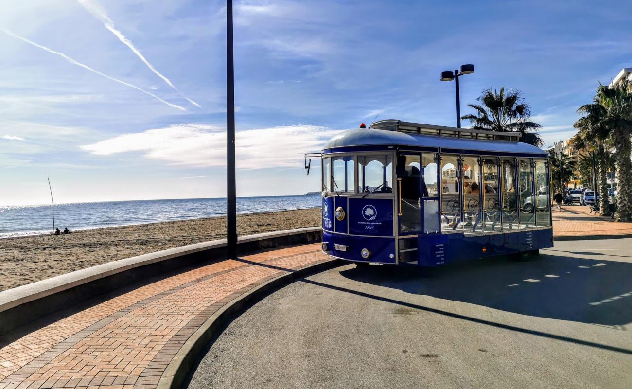 Фото Playa Torreblanca с серый песок поверхностью