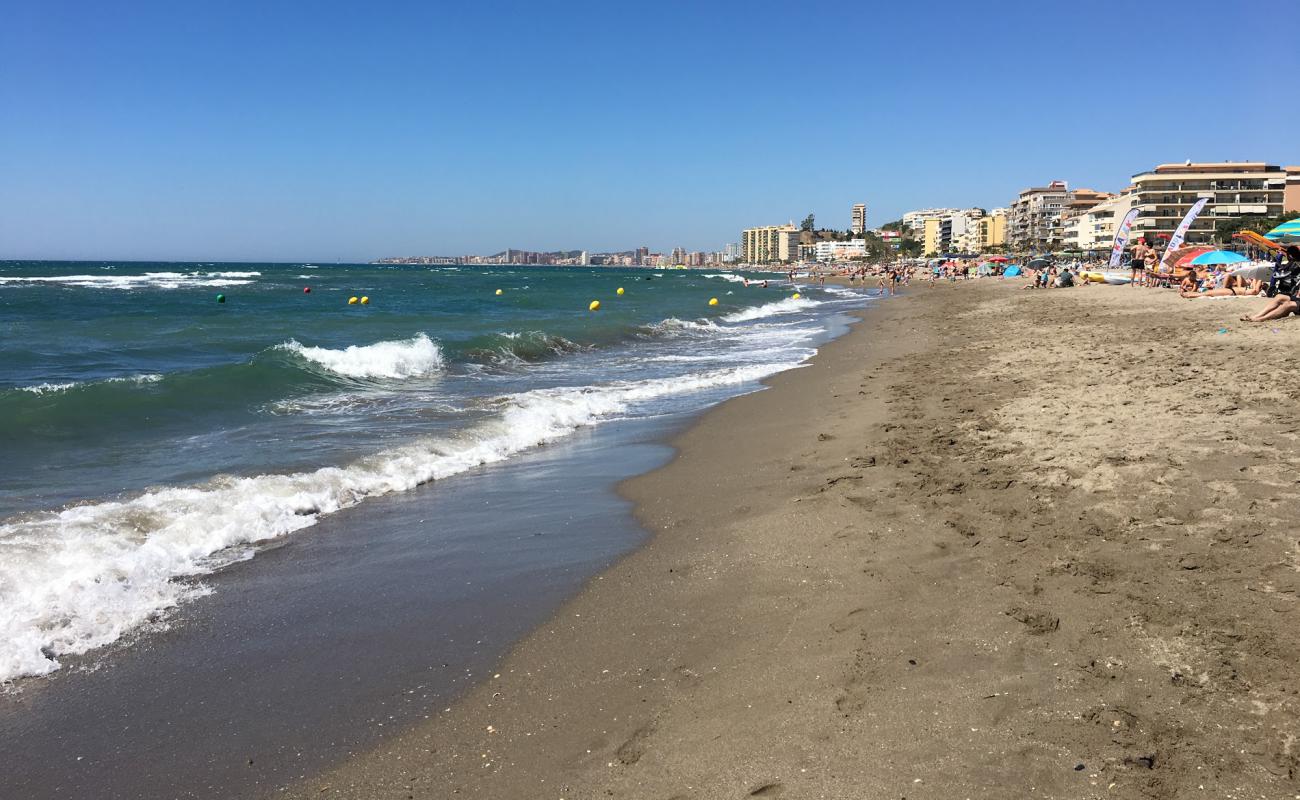 Фото Playa de Carvajal с серый песок поверхностью